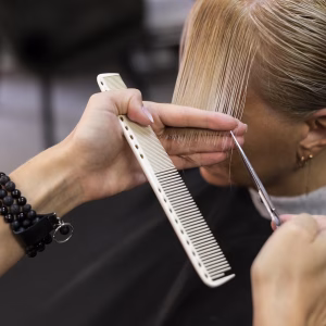woman-getting-her-hair-cut-beauty-salon